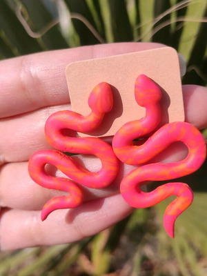 Handmade earrings new, orange polymer clay and steel