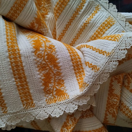 Woven blanket new with handmade knitted lace and fringes