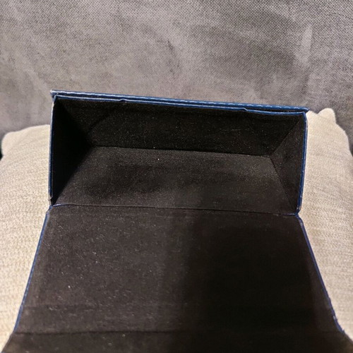 Blue leather glasses case used with magnetic clasp