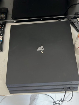 PlayStation 4 Pro like new with two controllers, 1TB storage