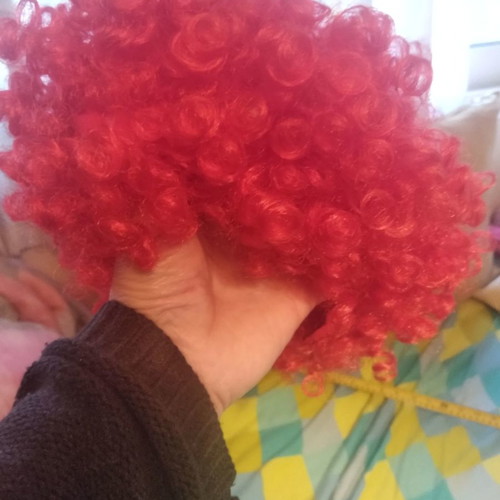 Orange carnival wig used with curly hair