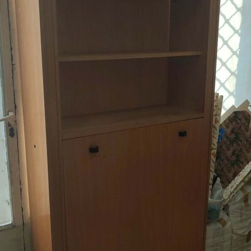 Bookcase with foldable bed used