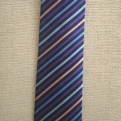 Otomelara tie with diagonal stripes in purple, black, mauve and blue