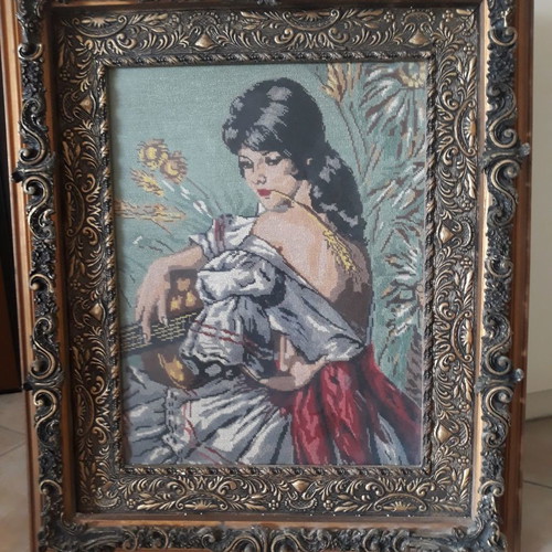 Collectible painting used with handmade gold-embroidered frame