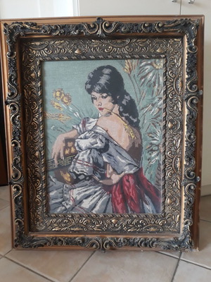 Collectible painting used with handmade gold-embroidered frame
