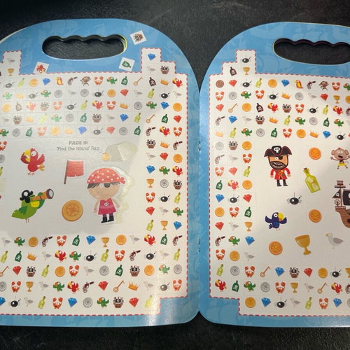 Children's activity book with puzzles and stickers in English like new