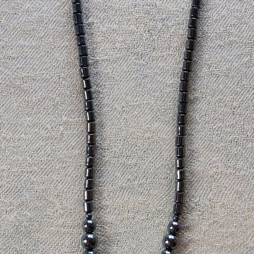 Hematite necklace like new with dolphin pendant