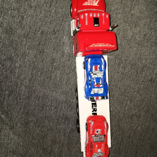 Toy truck like new with two toy cars