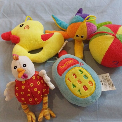 Set of 5 baby toys with octopus, ball, duck, rattle, chicken, and phone