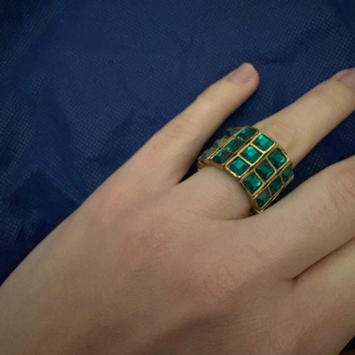 Adjustable gold ring with emerald stones like new