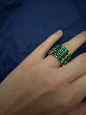 Adjustable gold ring with emerald stones like new