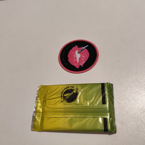 Queens of the Stone Age patch and trading cards set new