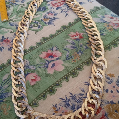 Necklace used, thick gold-tone chain with embossed finish