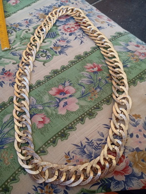 Necklace used, thick gold-tone chain with embossed finish