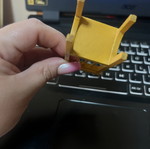 Miniature yellow chair used