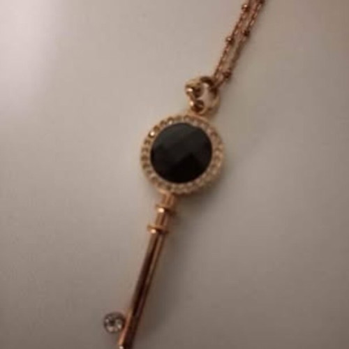Folli Follie key necklace with long chain and authentic zircon
