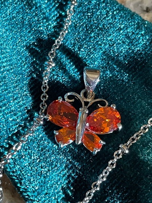 Necklace with orange butterfly pendant like new