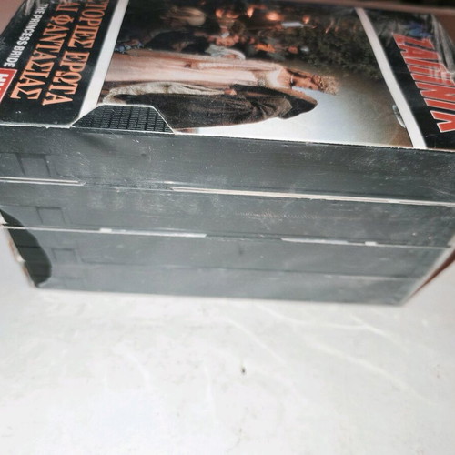 Collection of 4 new videocassettes, pack