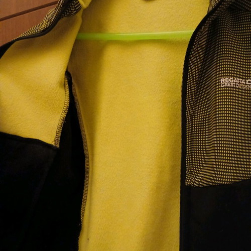 Regatta athletic jacket used for 6-year-old boy, black and green
