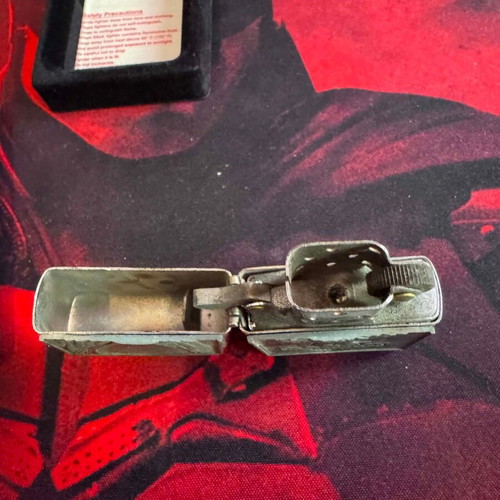 Zippo lighter with embossed eagle used
