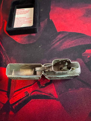 Zippo lighter with embossed eagle used