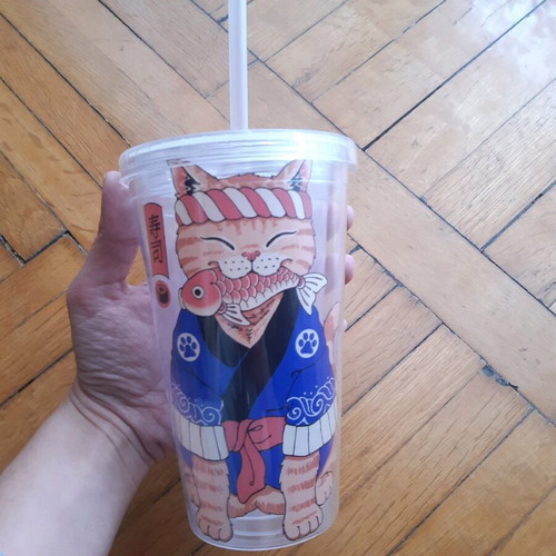 Cup with straw used, double wall for coffee and juices