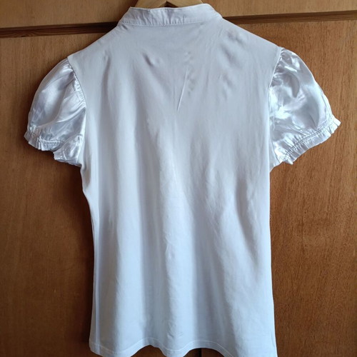 White blouse with satin ruffles and decorative crystal buttons, like new