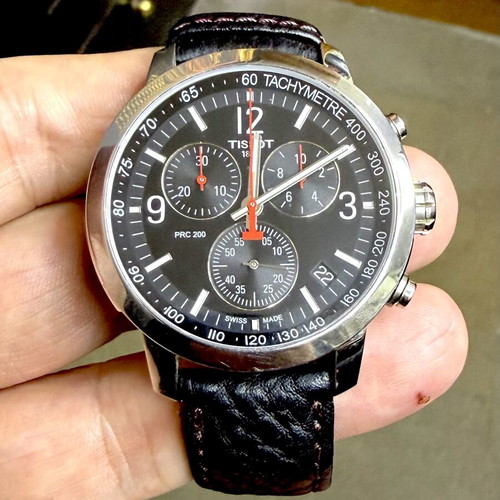 Tissot PRC 200 chronograph watch, black dial, leather strap