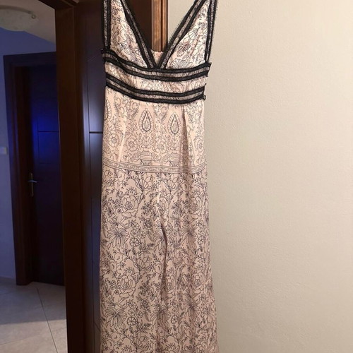 Zini one-piece small like new, black and beige