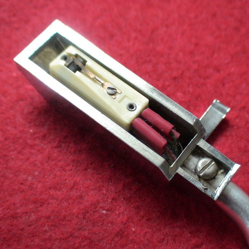 Record player tonearm with head shell and cartridge used, unknown type