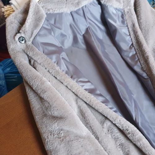 Gray faux fur coat used with soft fur and central button