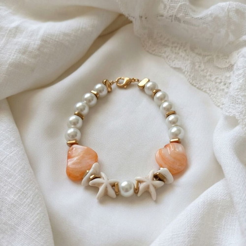 Bracelet with synthetic pearls and starfish, new