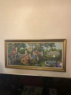 Vintage handmade embroidery on wooden frame, used