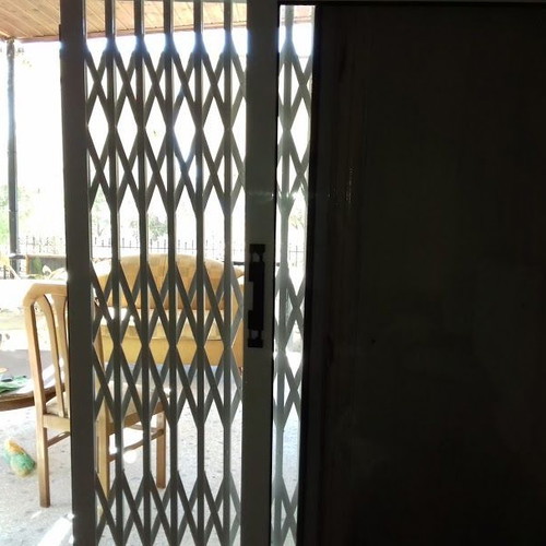 Aluminum balcony door used 116x198 with folding security grille