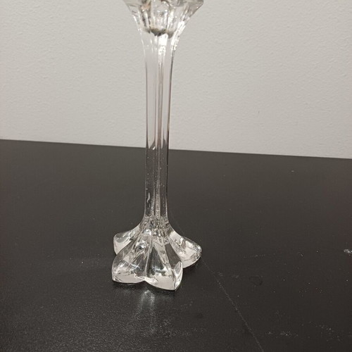 Tall crystal candlestick used with flower shape