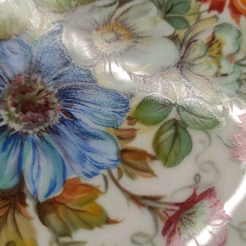 Kaiser decorative wall plate like new with hand-painted floral design