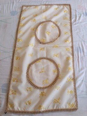 Table linens used, round tablecloth and rectangular runner