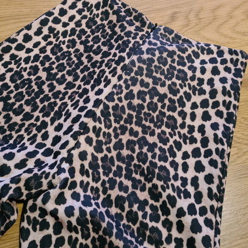 Leopard bell-bottom pants like new, size S