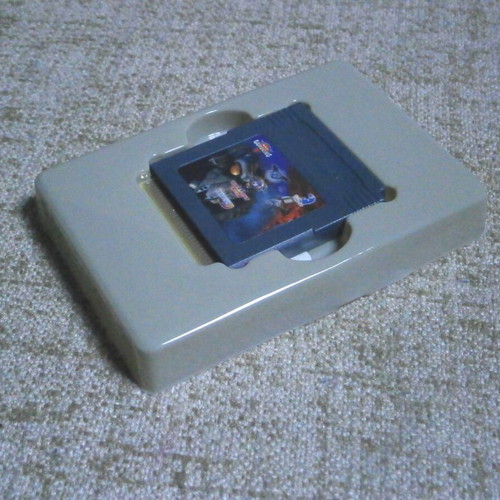 GameKing 4-in-1 cartridge with Clever Hawk Warrior Valiant Metal DeforN action games