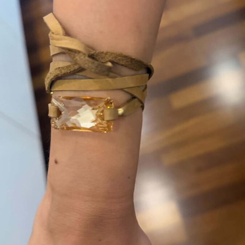 Leather bracelet with crystal in beige and gold tones, like new
