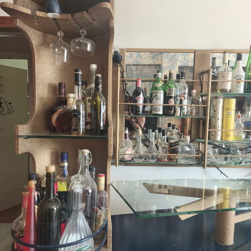 Living room bar used with large storage and glass shelves
