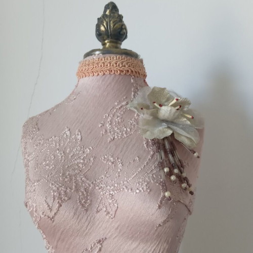 Decorative body like new with embossed designs and fringes