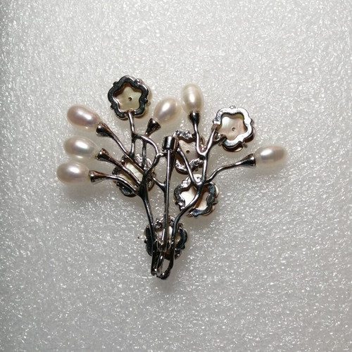 Metal brooch new with cultured pearls and shell flowers