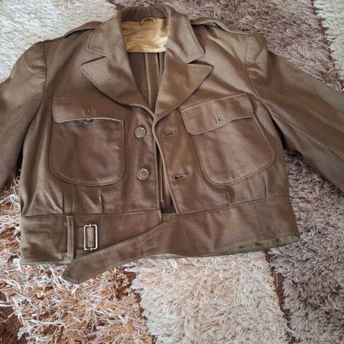 Vintage military jacket used with minor wear