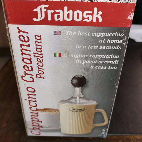 Cappuccino creamer used, porcelain