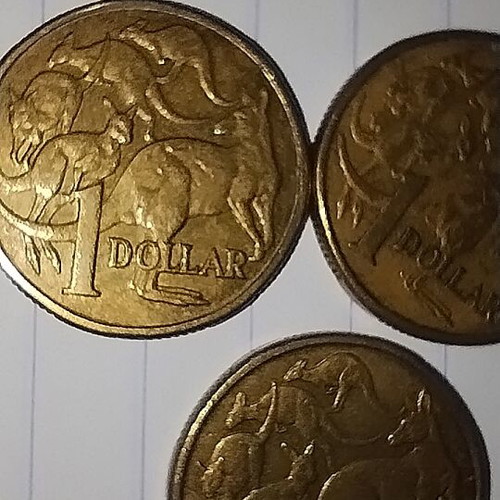 Australian coins used, pack of 4 one dollar pieces