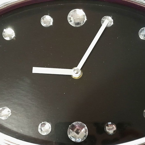 Oval wall clock like new with crystals, analog