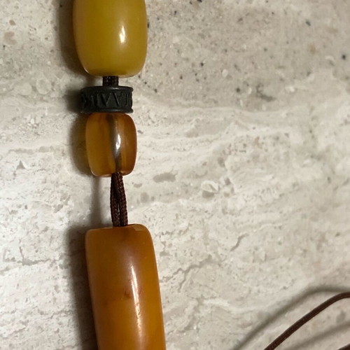 Worry beads used from royal amber with silver logo