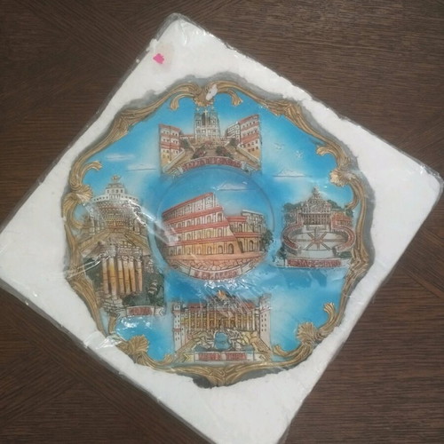 Decorative souvenir plate from Rome with embossed landmarks, new