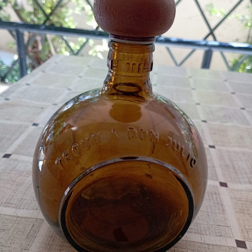Don Julio Anejo tequila round collectible bottle, amber glass